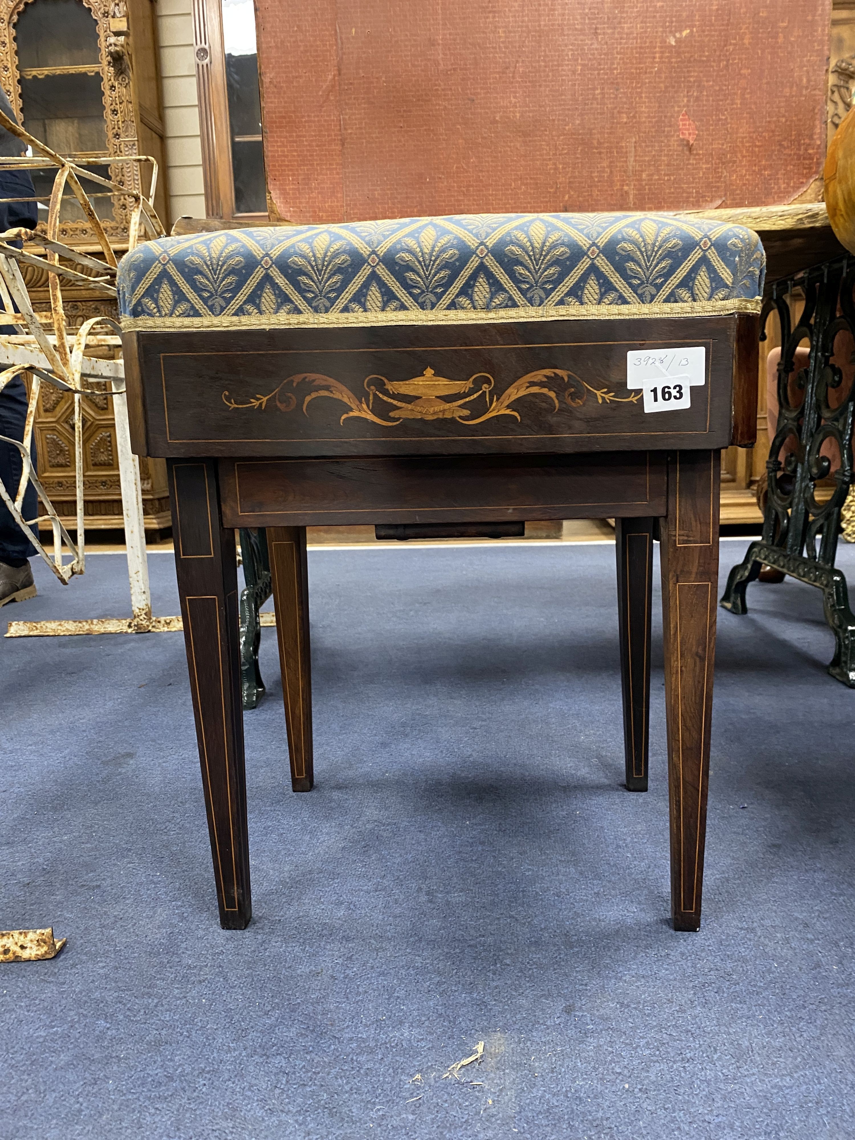 An Edwardian marquetry inlaid rosewood adjustable piano stool